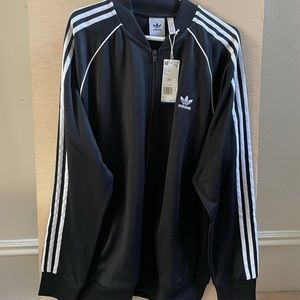 Adidas track suit black 2xl zip up jacket and black XL pants NEW never worn.